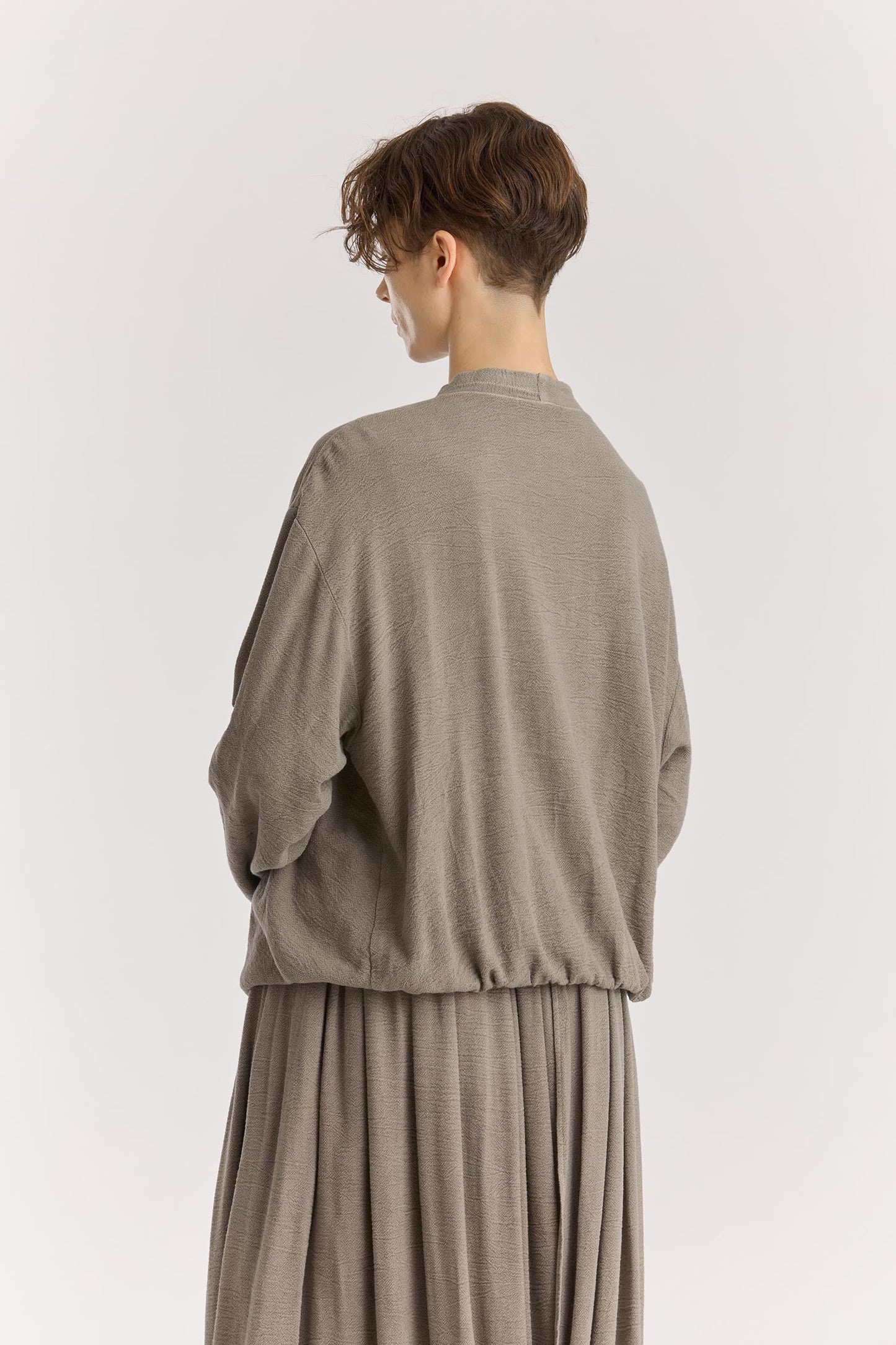 DRAPY SHIRTS / DK. STONE
Stand collar
A single button closure at the front
Crossed shirts
Double-layered front body
Textured 50% Rayon 50% Cotton
Cold machine or hand wash, tumble dry low or dry flat, no bleach
Style Number: RC-DPS01
Relaxed fit
MADE IN USA