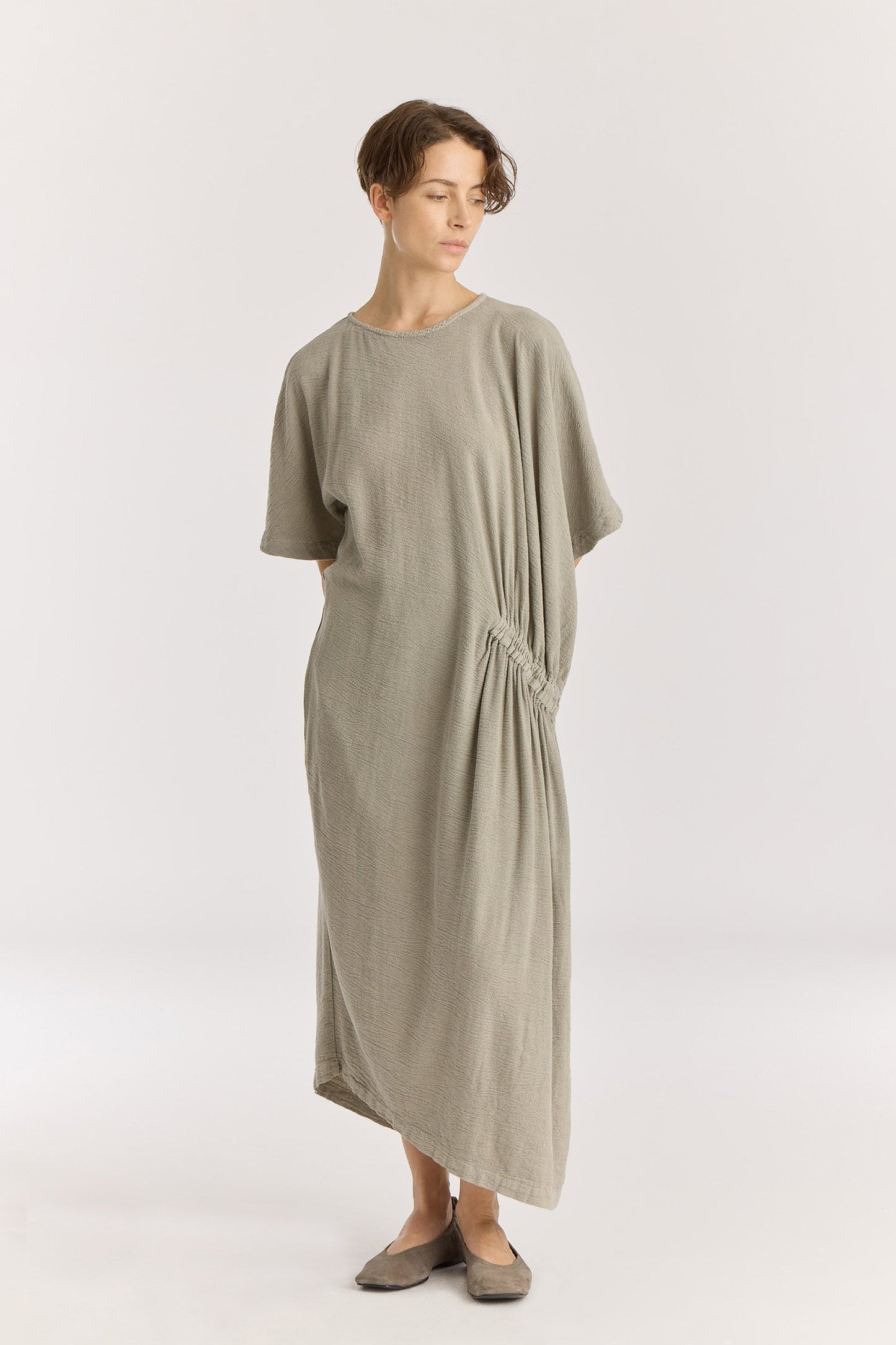 GREEK DRESS / LIMESTONE
Basic crew neck with self-binding
One side seam pocket
Elastic details at the front and back
Inner string across the waist to tie for different silhouette
Textured 50% Rayon 50% Cotton
Cold machine or hand wash, tumble dry low or dry flat, no bleach
Style Number: RC-GD03
Relaxed fit
MADE IN USA