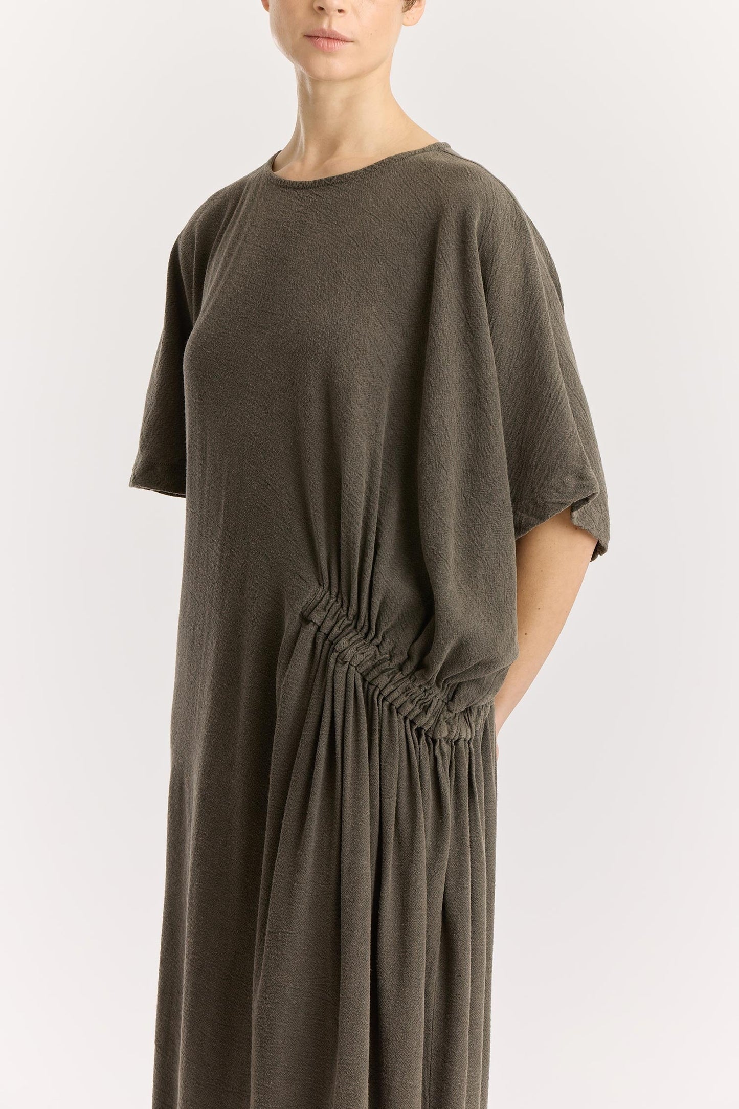 GREEK DRESS / SLATE
Basic crew neck with self-binding
One side seam pocket
Elastic details at the front and back
Inner string across the waist to tie for different silhouette
Textured 50% Rayon 50% Cotton
Cold machine or hand wash, tumble dry low or dry flat, no bleach
Style Number: RC-GD03
Relaxed fit
MADE IN USA