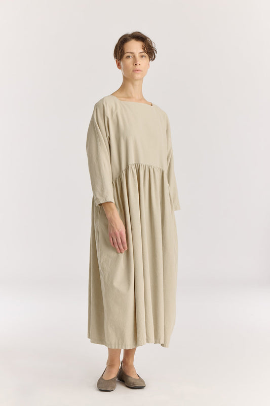 Tradi Dress / Ivory
Square neckline with facing
Dolman sleeves&nbsp;
Shirring on front and back for volume bottom
Side seam pockets
100% Cotton baby corduroy
Cold machine or hand wash, tumble dry low or dry flat, no bleach
Style number: BC-TRD01
Relaxed Fit
Made in USA
