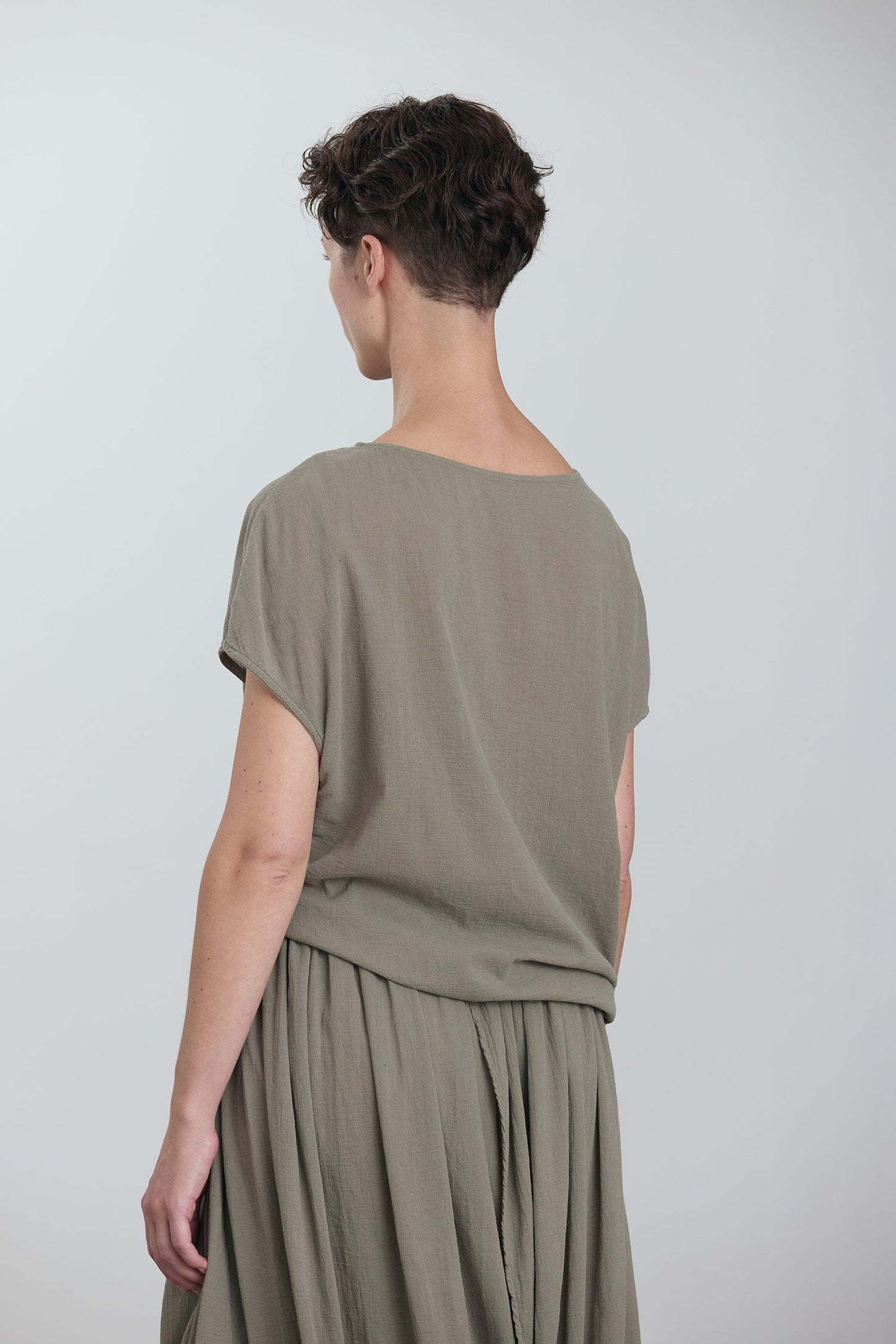 ASYMMETRIC TOP / CEMENT
