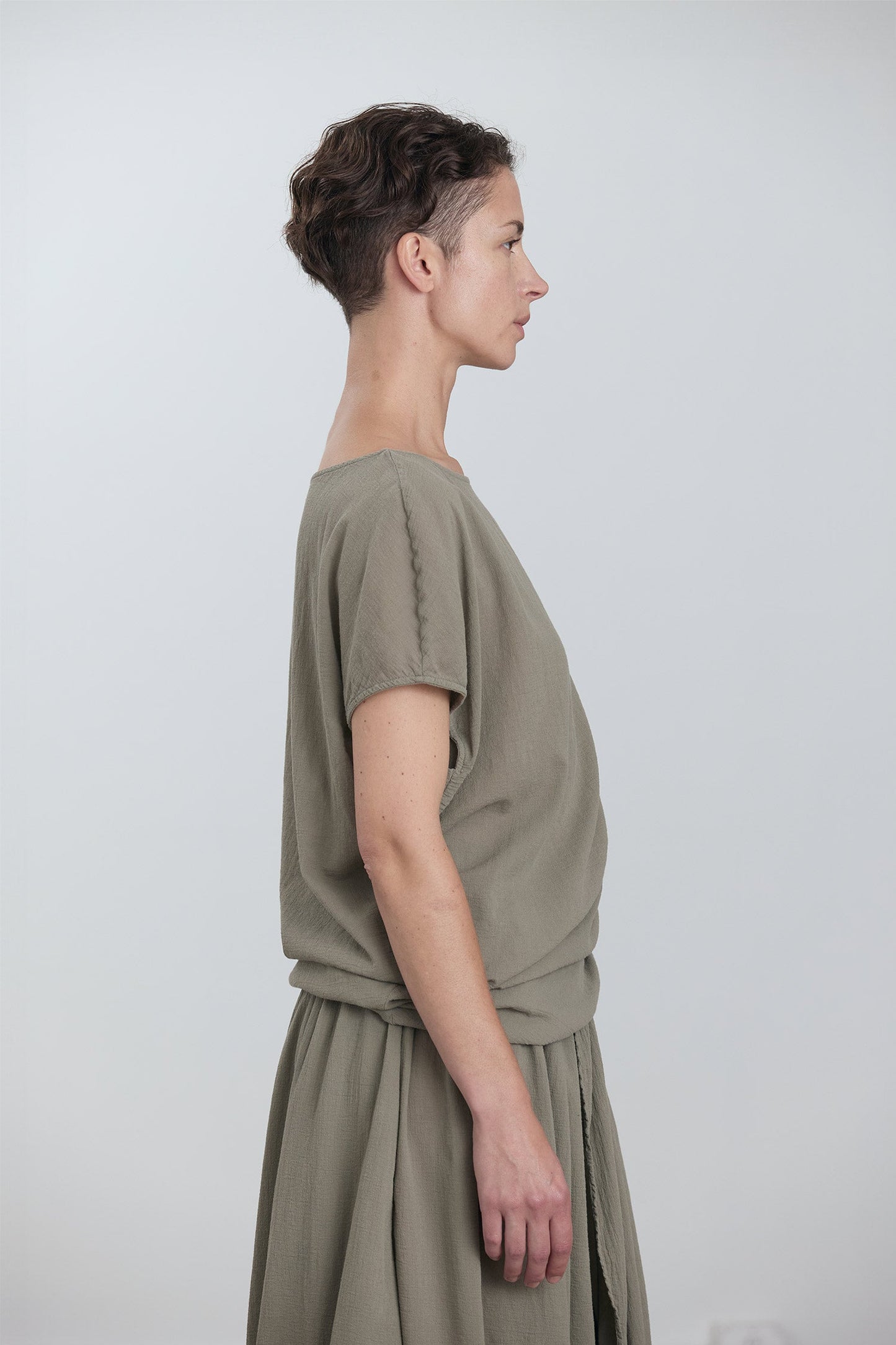 ASYMMETRIC TOP / CEMENT
