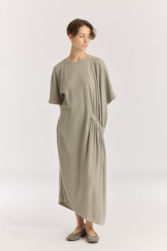 GREEK DRESS / LIMESTONE
Basic crew neck with self-binding
One side seam pocket
Elastic details at the front and back
Inner string across the waist to tie for different silhouette
Textured 50% Rayon 50% Cotton
Cold machine or hand wash, tumble dry low or dry flat, no bleach
Style Number: RC-GD03
Relaxed fit
MADE IN USA