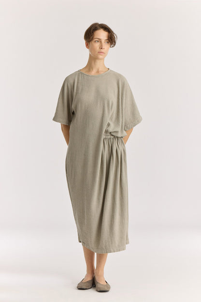 GREEK DRESS / LIMESTONE
Basic crew neck with self-binding
One side seam pocket
Elastic details at the front and back
Inner string across the waist to tie for different silhouette
Textured 50% Rayon 50% Cotton
Cold machine or hand wash, tumble dry low or dry flat, no bleach
Style Number: RC-GD03
Relaxed fit
MADE IN USA
